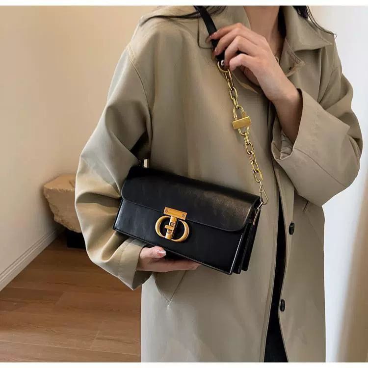 Black Leather Crossbody Bag with Gold Chain & Elegant Clasp