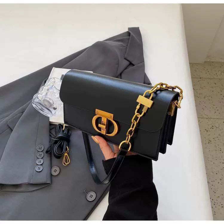 Black Leather Crossbody Bag with Gold Chain & Elegant Clasp