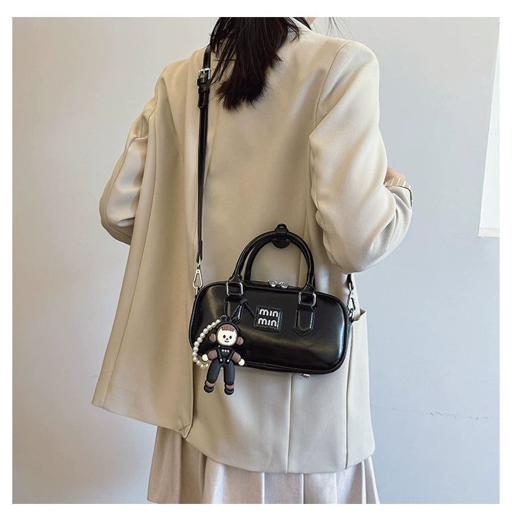Min Min Black Handbag with Doll Charm & Detachable Crossbody Strap